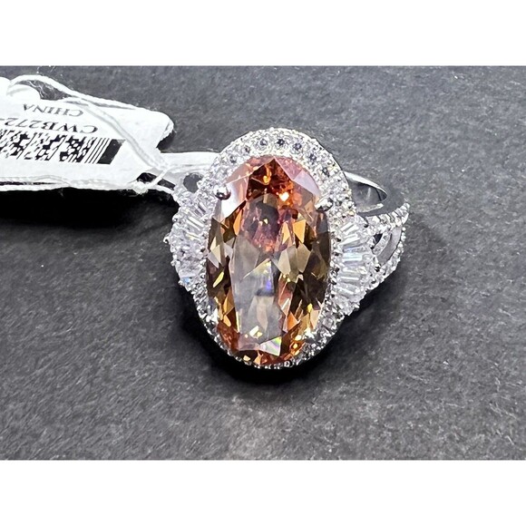 Bella Luce Jewelry - Bella Luce Champagne Simulated Diamond 13.00CT Oval Ring Rhodium Plated